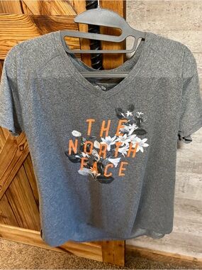 The North Face Gray Tee with Orange Logo and Floral Print